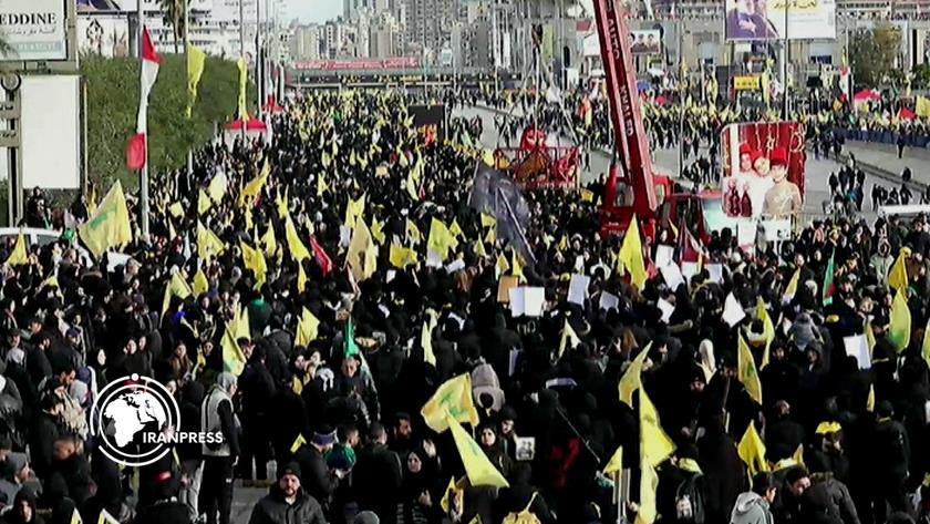 Iranpress: حضور جماهيري واسع في مراسم تشييع الشهيدين نصرالله وصفي الدين + فيديو