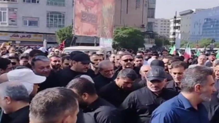 Iranpress: بالصور.. حضور المسؤولين الإيرانيين في تشييع جثامين الشهداء في طهران